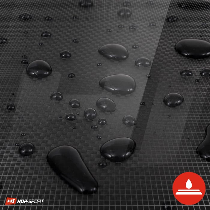 Acercamiento a la cubierta impermeable del colchón de gimnasia Hop-Sport en color negro