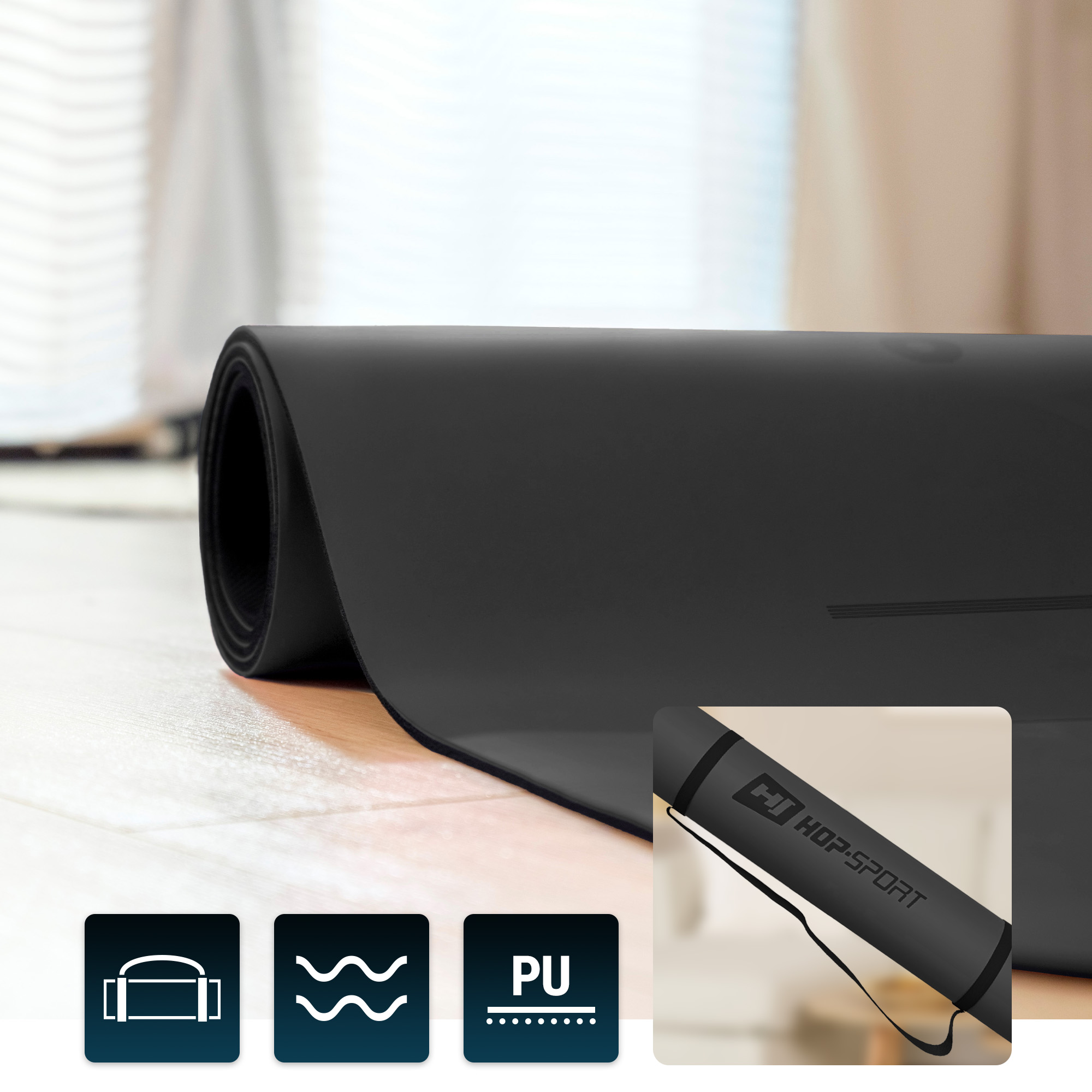 acercamiento a la esterilla de yoga negra enrollada de la marca Hop-Sport con la correa de transporte visible