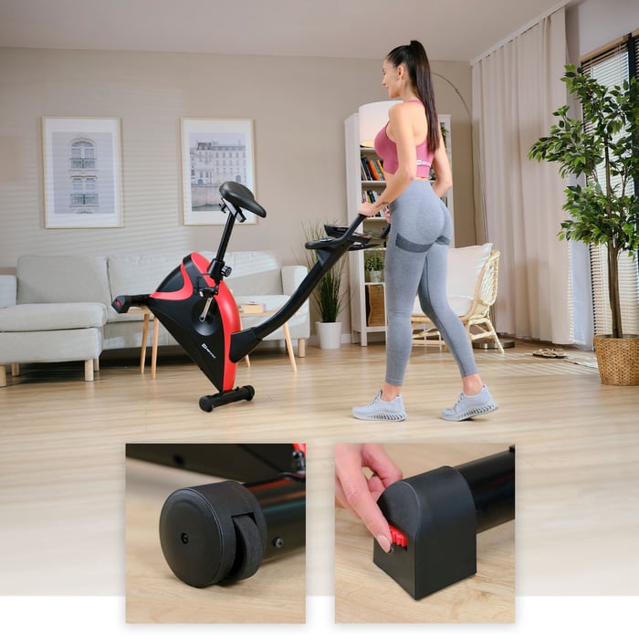 Bicicleta estática HS-005H Host roja con patas niveladoras y ruedas de transporte