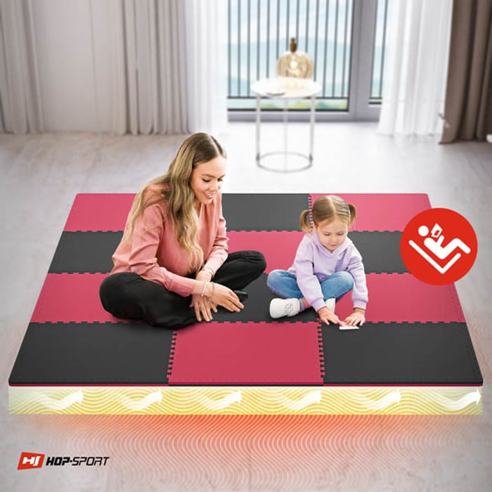 Mujer con una niña pequeña sentadas en la esterilla Puzzle negro-rojo de 2cm 12 piezas