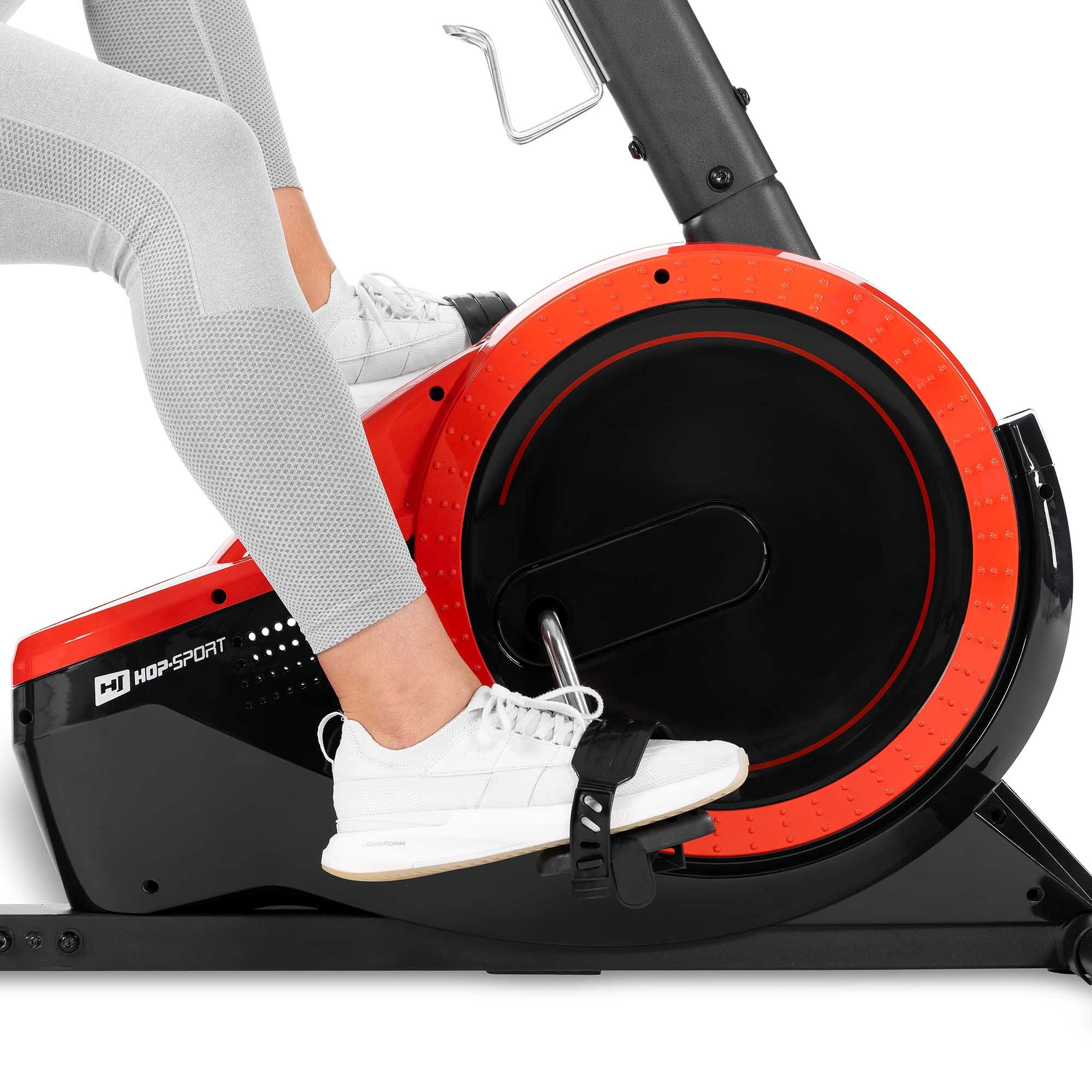 Bicicleta reclinada magnética HS-060L Pulse roja equipada con pedales antideslizantes con correas de bloqueo