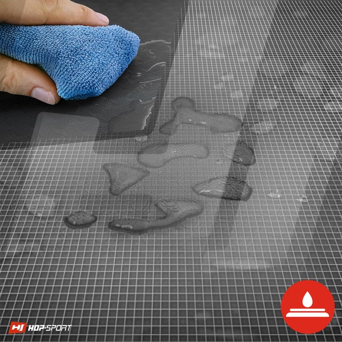 Se muestra la impermeabilidad de la esterilla con agujeros TPE en color negro-rojo de la marca Hop-sport